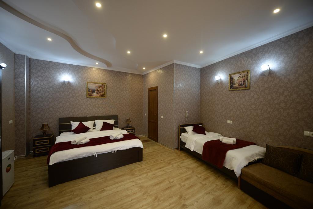 Begi Hotel Tbiliszi Szoba fotó